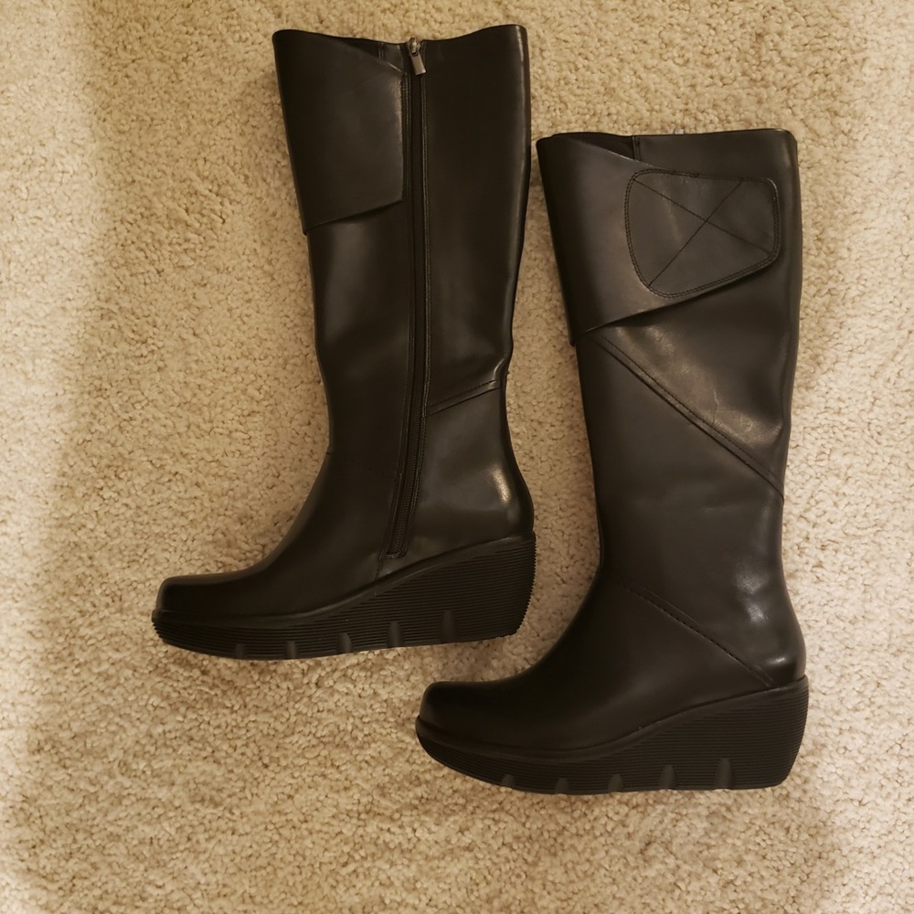 Clark’s black leather platform boots